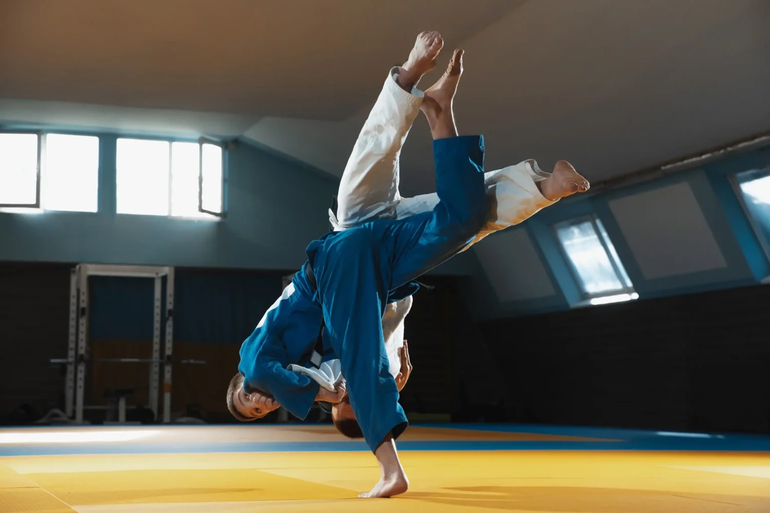 two-young-judo-fighters-kimono-training-martial-arts-gym-with-expression-action-motion (Web H)
